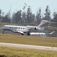 Private jet taking off during business aviation operations in South America