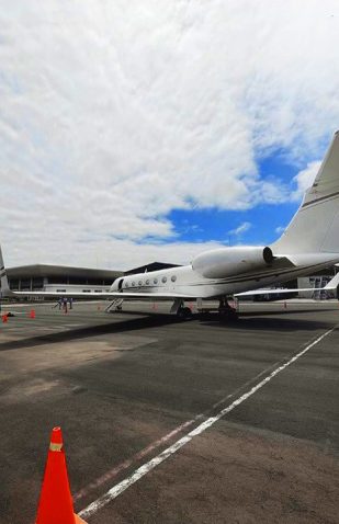 Private jet parked on the runway during business aviation operations